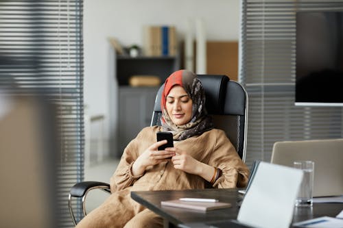 Woman Sitting on her Chair