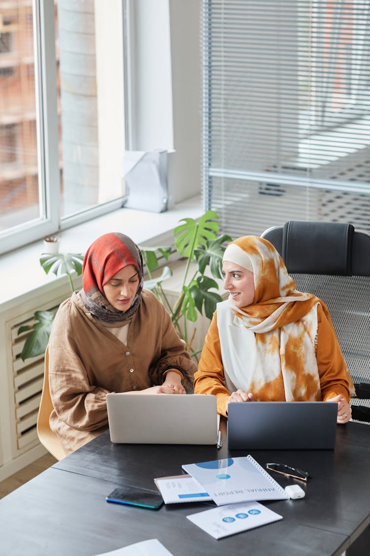 Women In Front Of Their Laptops