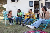 3 Boys Playing Musical Instruments