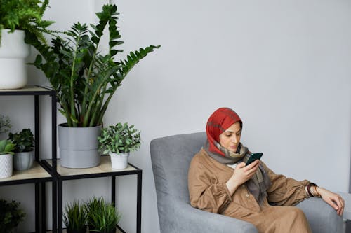 A Woman Browsing Her Smartphone