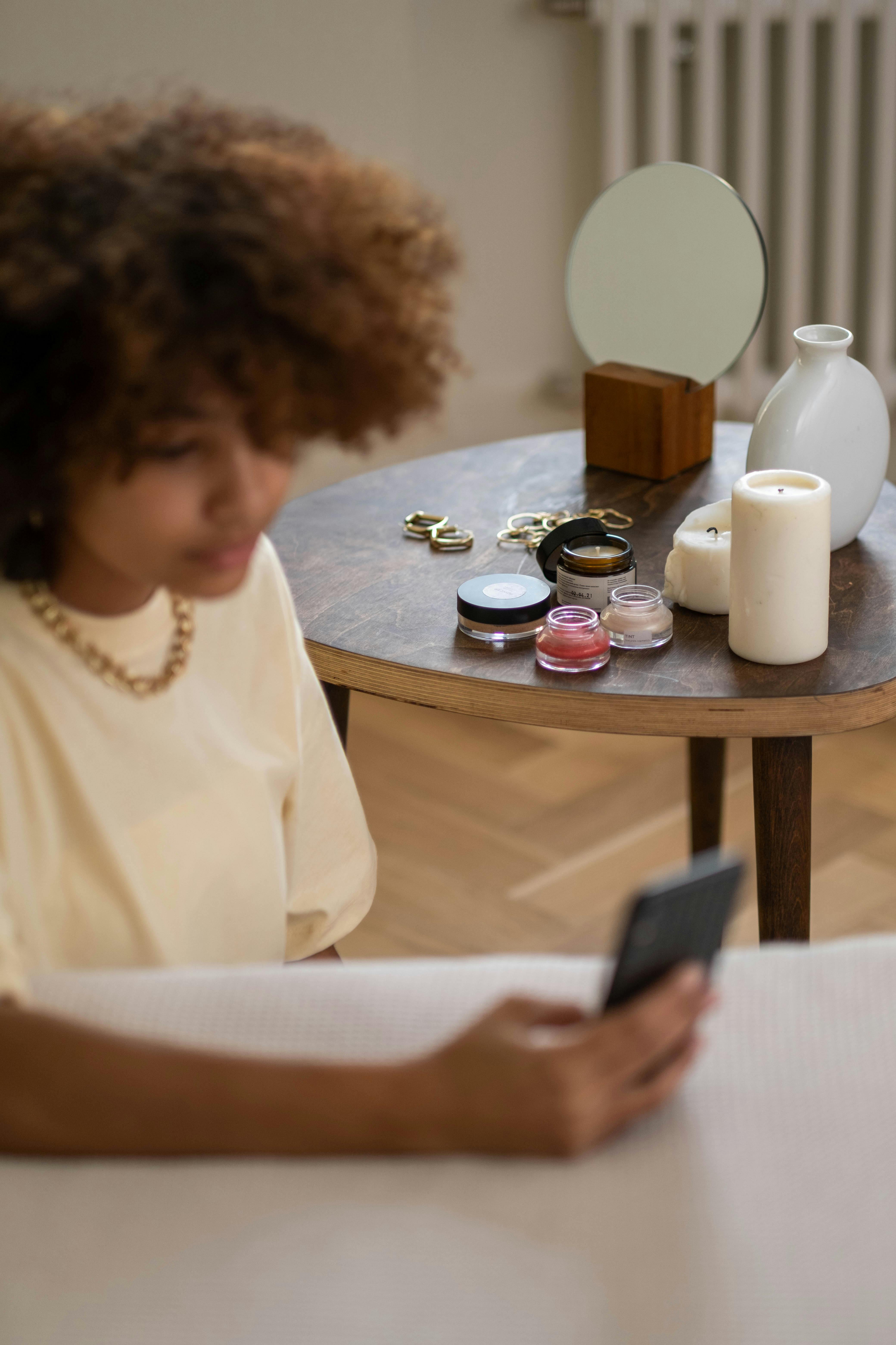 girl holding black smartphone