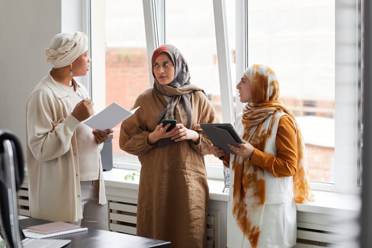 Women Talking At An Office