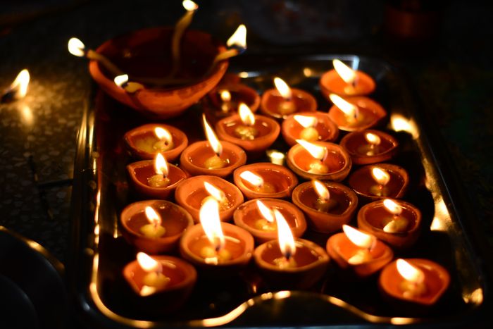 Festive thali with glowing diyas
