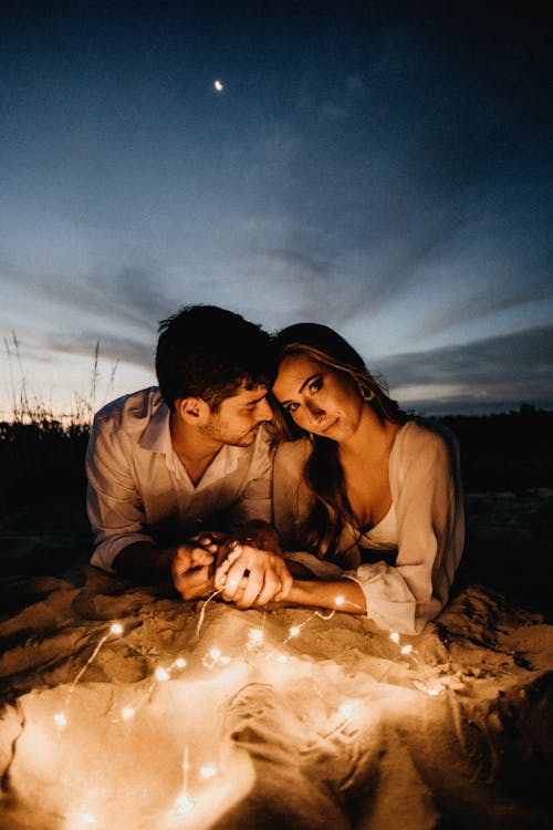 Couple spending time in night outside