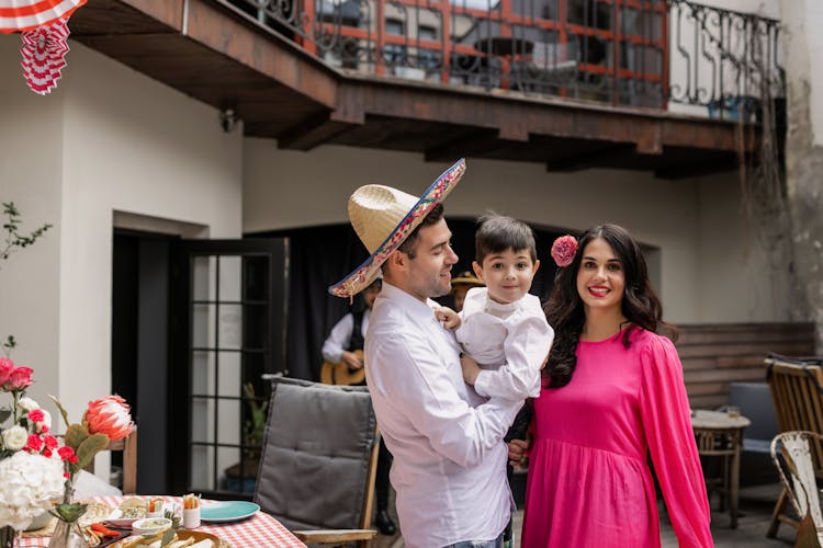 A Family Posing At The Camera