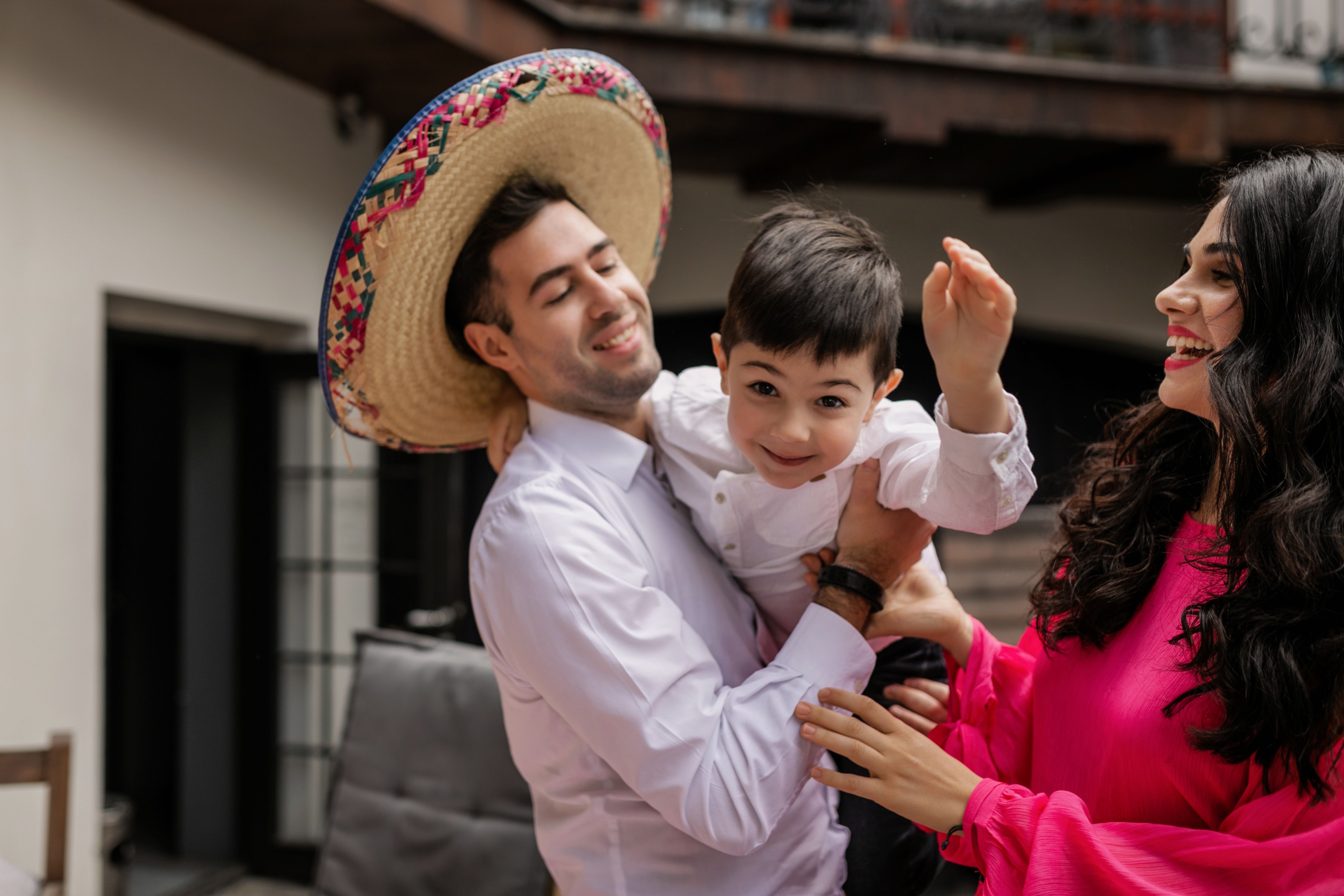 Mexican family discussing financial stability in a calm setting