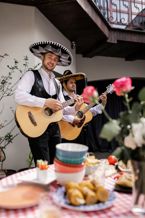Men in Sombreros Playing Guitars on Party