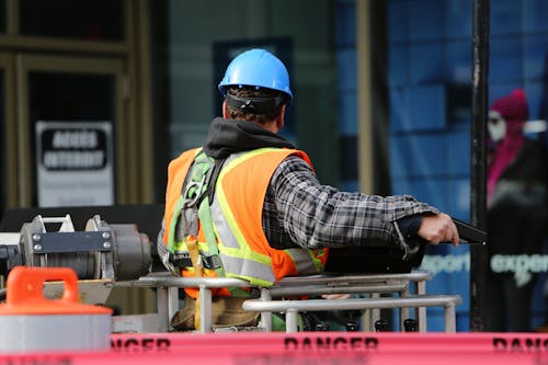 Man Wearing Hard Hat Standing