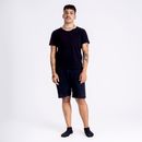 Man in Black Crew Neck T-shirt and Black Shorts
