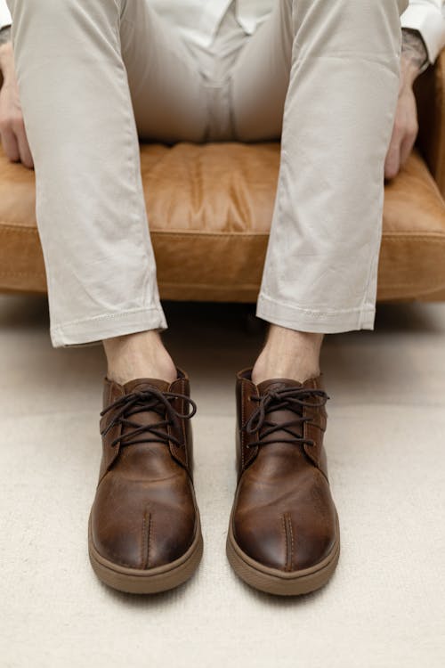 Person Wearing Brown Leather Shoes