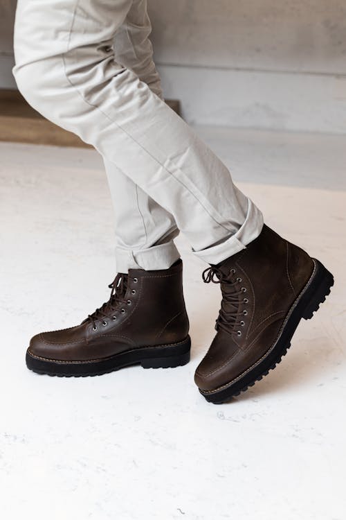 Person Wearing Brown Leather Boots