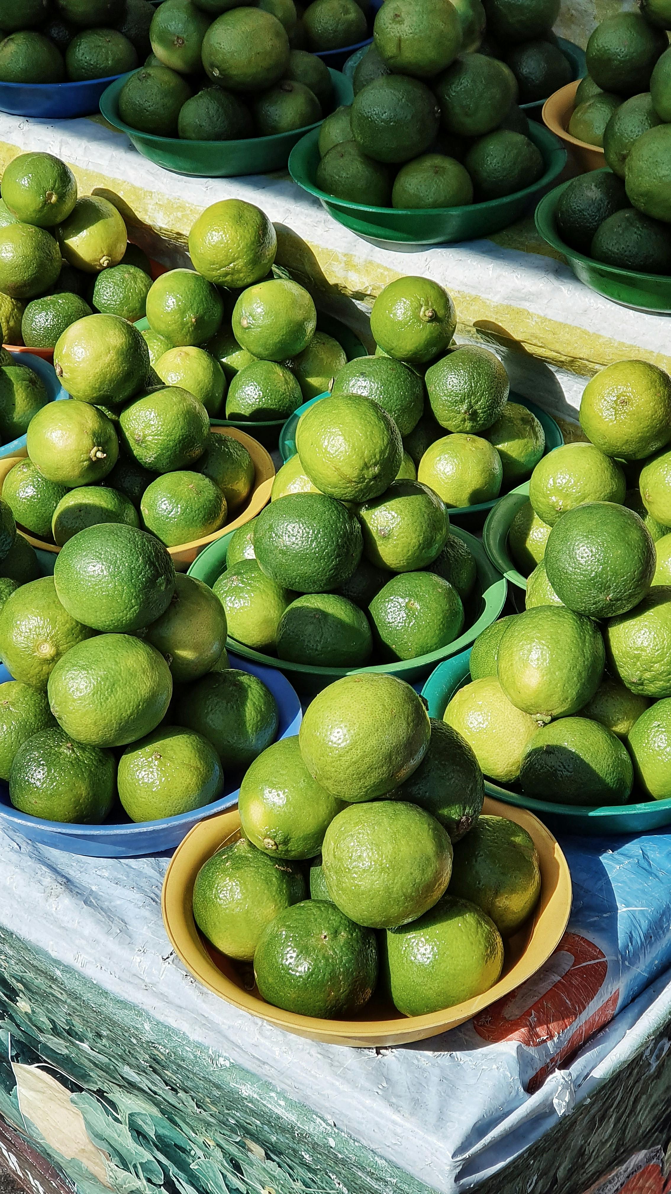 close up shot of piles of limes