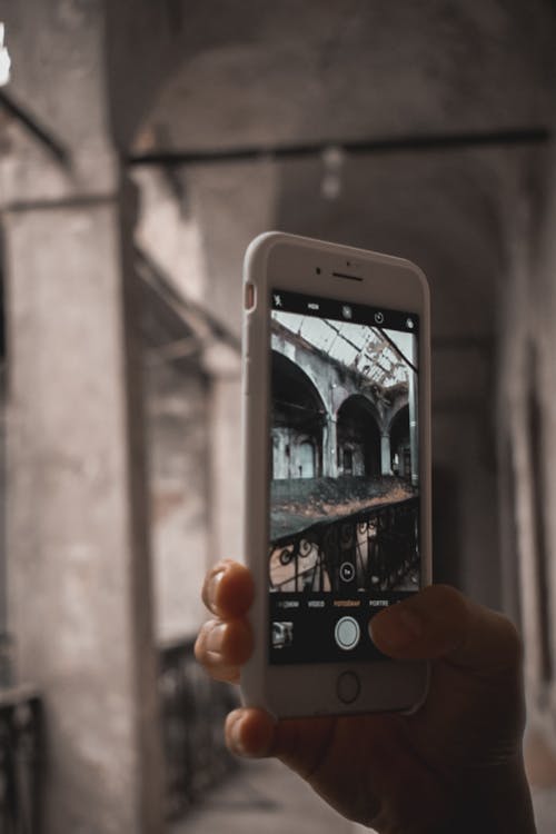 Close-Up Shot of a Person Taking Photo Using a Smartphone