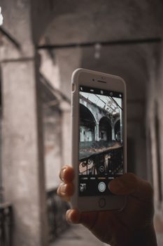 A smartphone capturing an indoor architectural scene, highlighting casual photography.