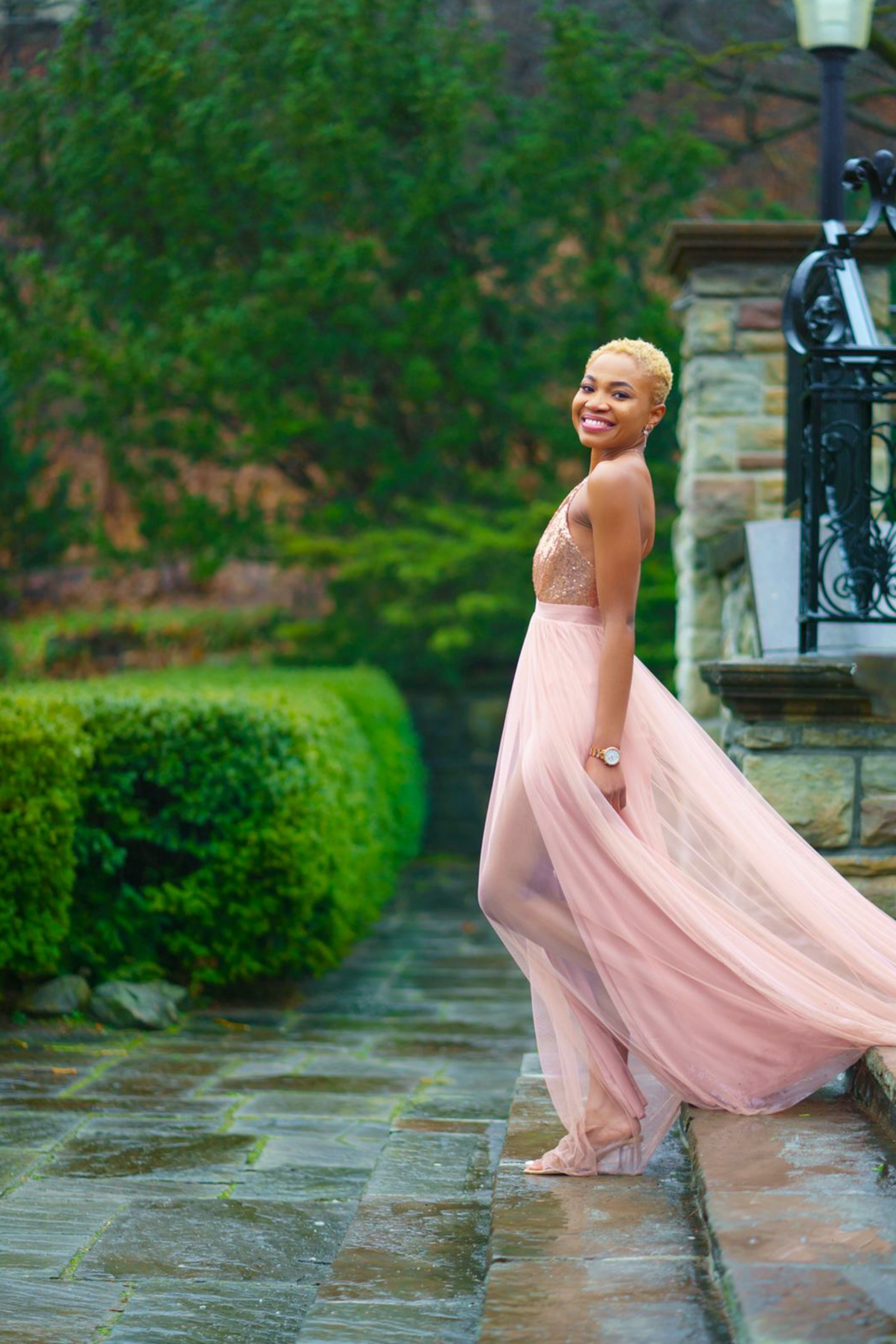 Woman in Pink Dress Standing on Stone Pavement · Free Stock Photo