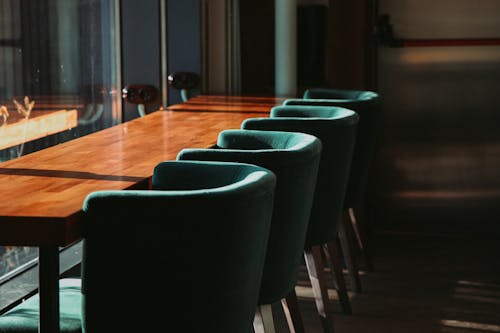 A Table and Chairs in a Room