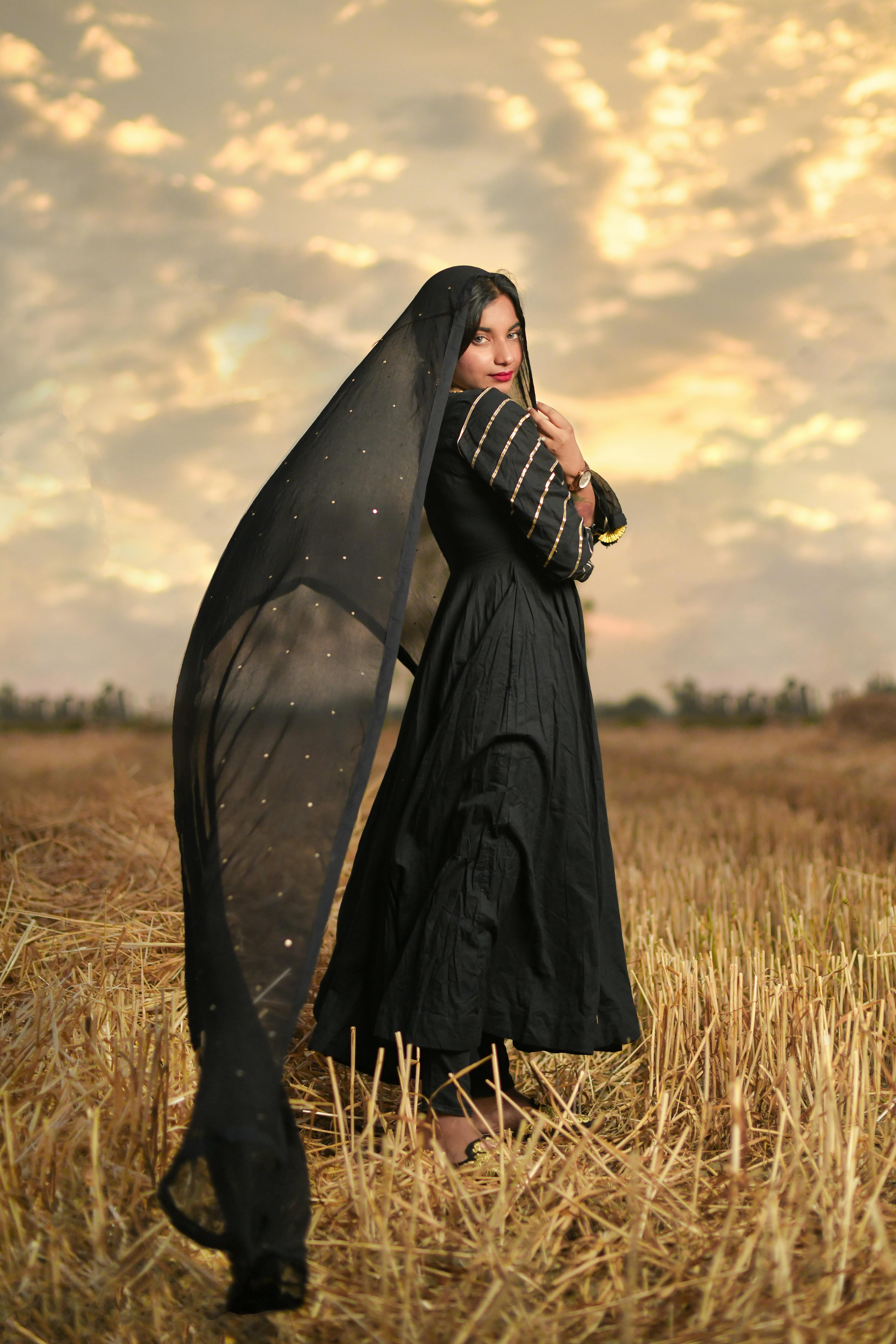 Woman Wearing a Black Dress with Veil · Free Stock Photo
