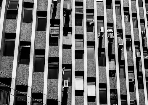 Grayscale Photo of a Concrete Building