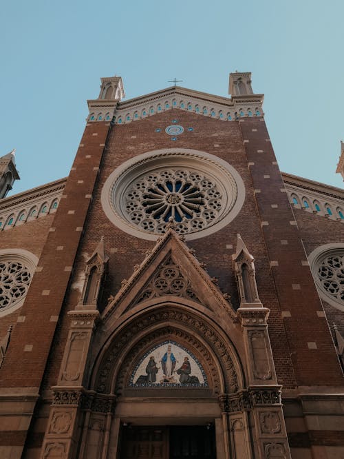 Free Low-Angle Shot of a Brown Cathedral Stock Photo