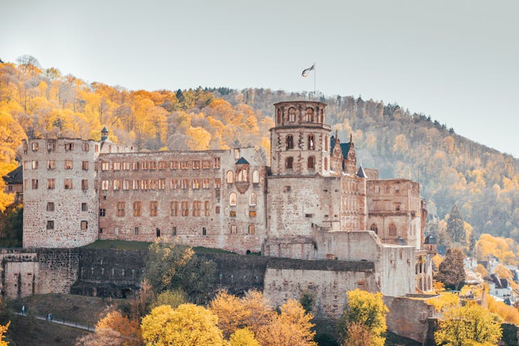 Ruined Old Castle On A Hill At Autumn 