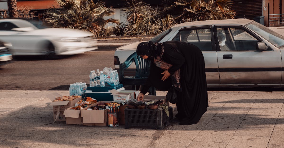 Woman Selling on the Street · Free Stock Photo