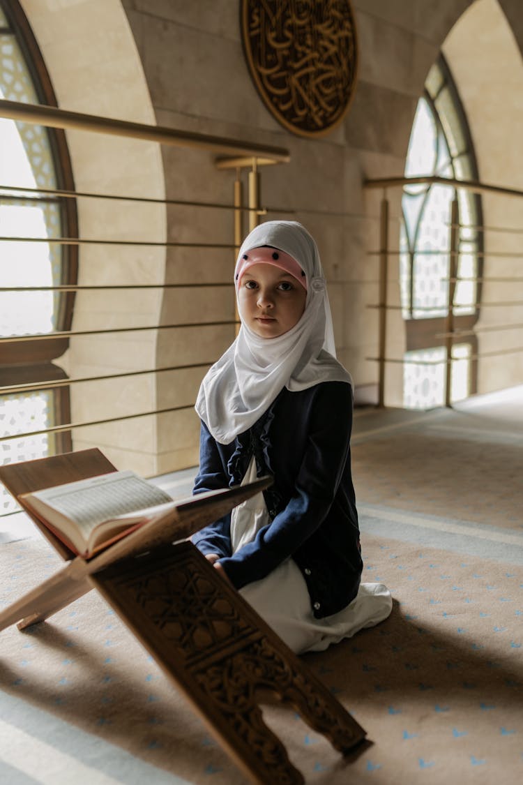 Little Girl Praying In The Mosque