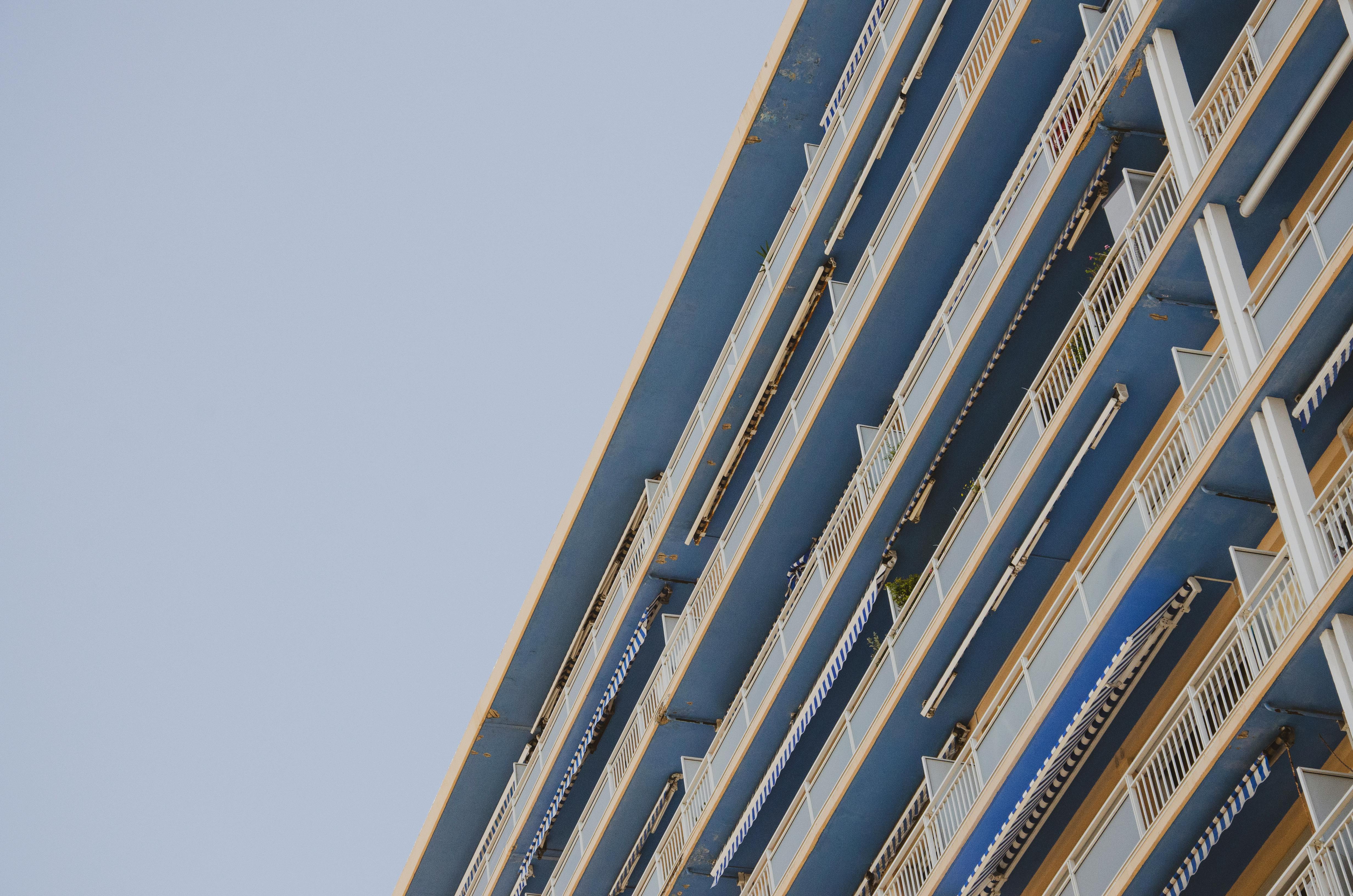 Free Low angle shot of a blue apartment building in Marseille, France, showcasing modern architectural design. Stock Photo