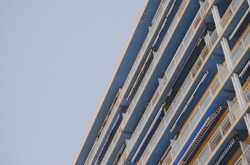 Free Low angle shot of a blue apartment building in Marseille, France, showcasing modern architectural design. Stock Photo