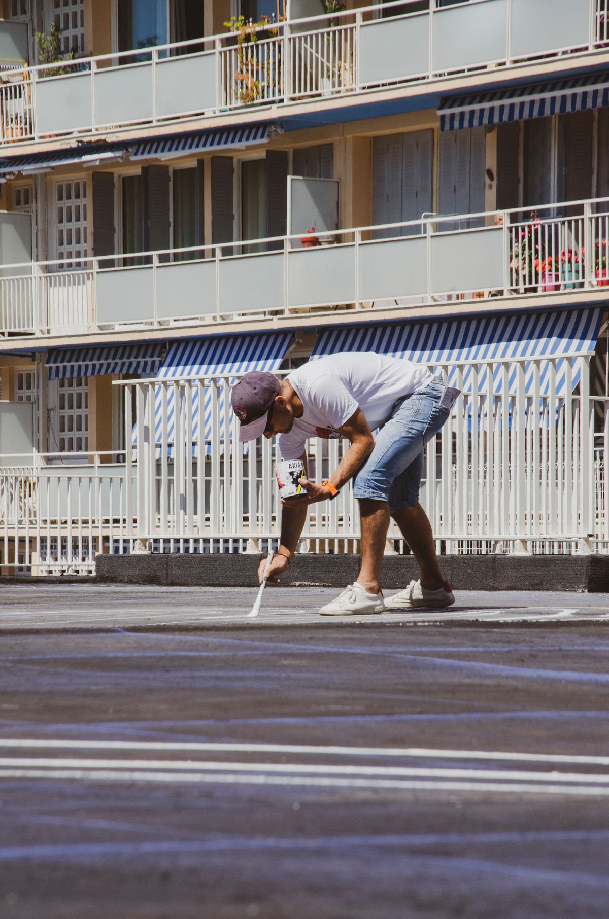Crew painting fresh parking lot lines