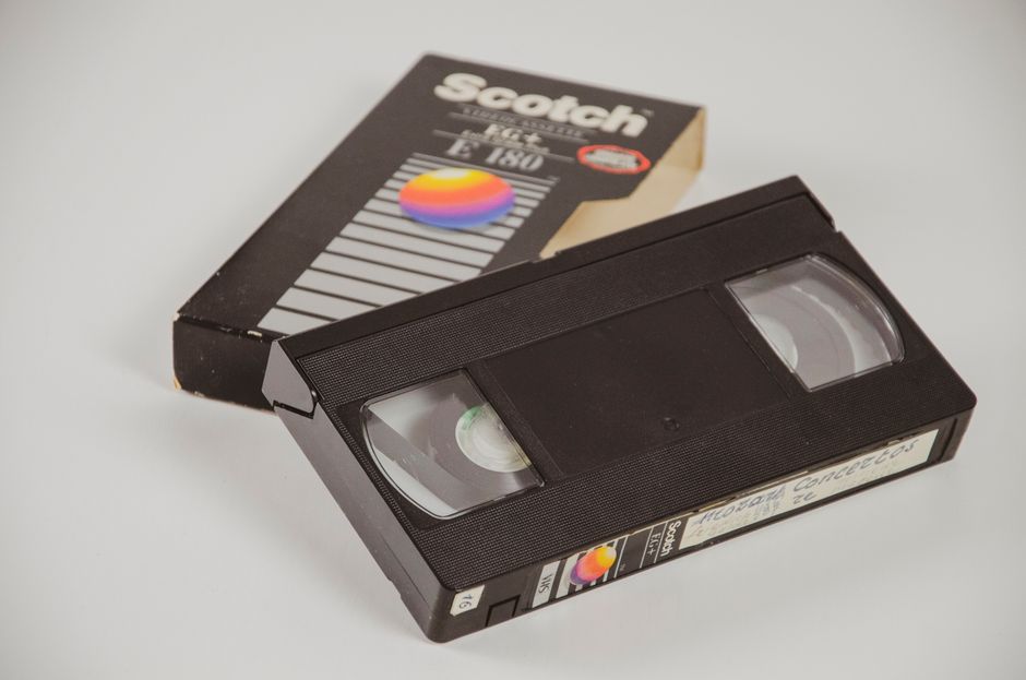 Classic VHS tape and box on a white background, evoking nostalgia and retro vibes.