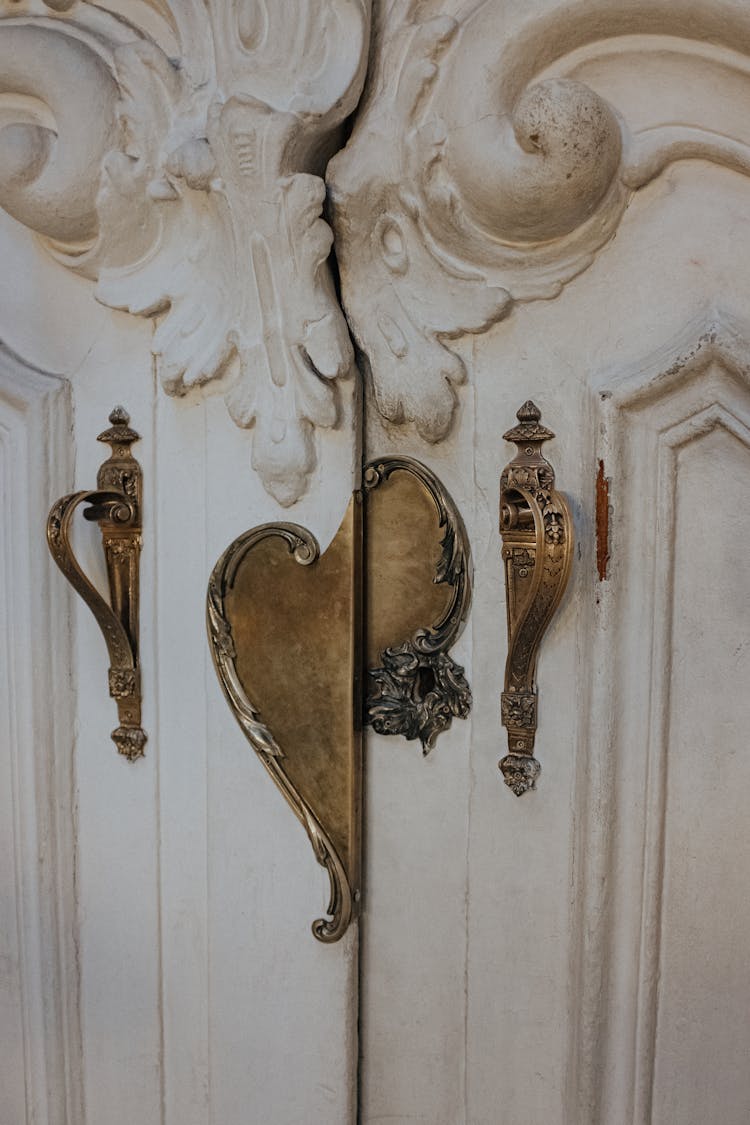 Ornate Wooden Door With Metal Handles