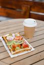 Fruit Pie with a Cup of Drink on a Wooden Table