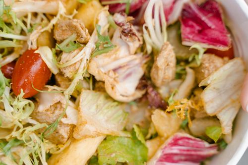Free Colorful vegetable salad featuring radicchio, lettuce, tomatoes, and croutons, perfect for a healthy diet. Stock Photo