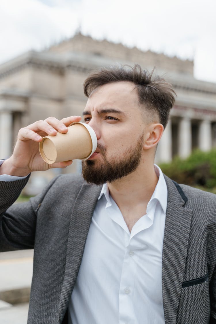 A Man Drinking Coffee