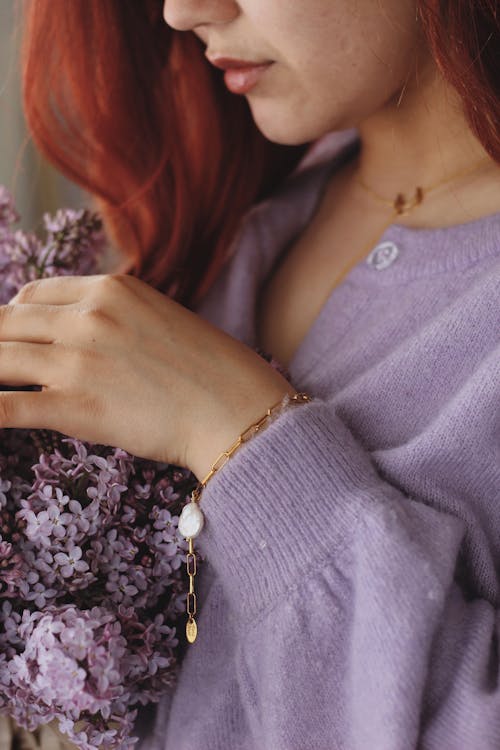 A Woman in Purple Knit Sweater