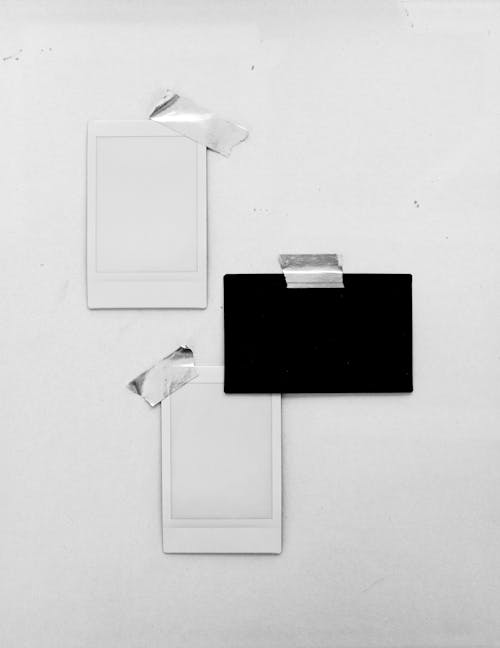 Black and White Paper on White Surface