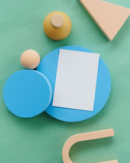 
A Piece of Paper on a Blue Circle Cutout