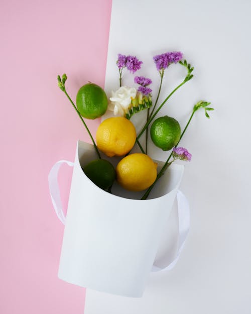 Foto stok gratis buah-buahan, bunga-bunga, kontainer