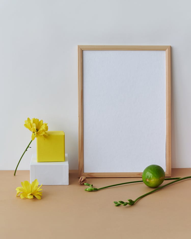 Blank Frame, Flowers And A Lime 