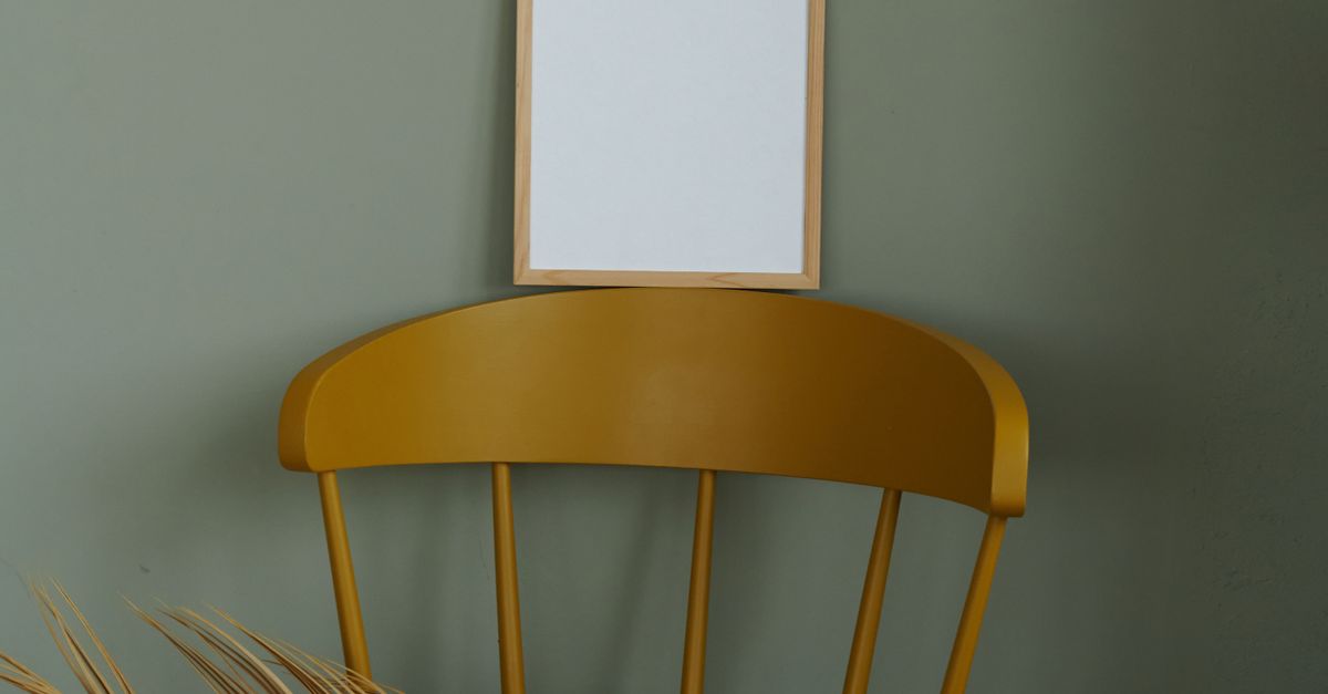Chair Photo Frame A Wooden Picture Frame on a Chair · Free Stock Photo