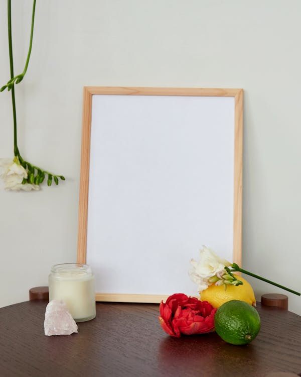 A Wooden Picture Frame on a Table · Free Stock Photo