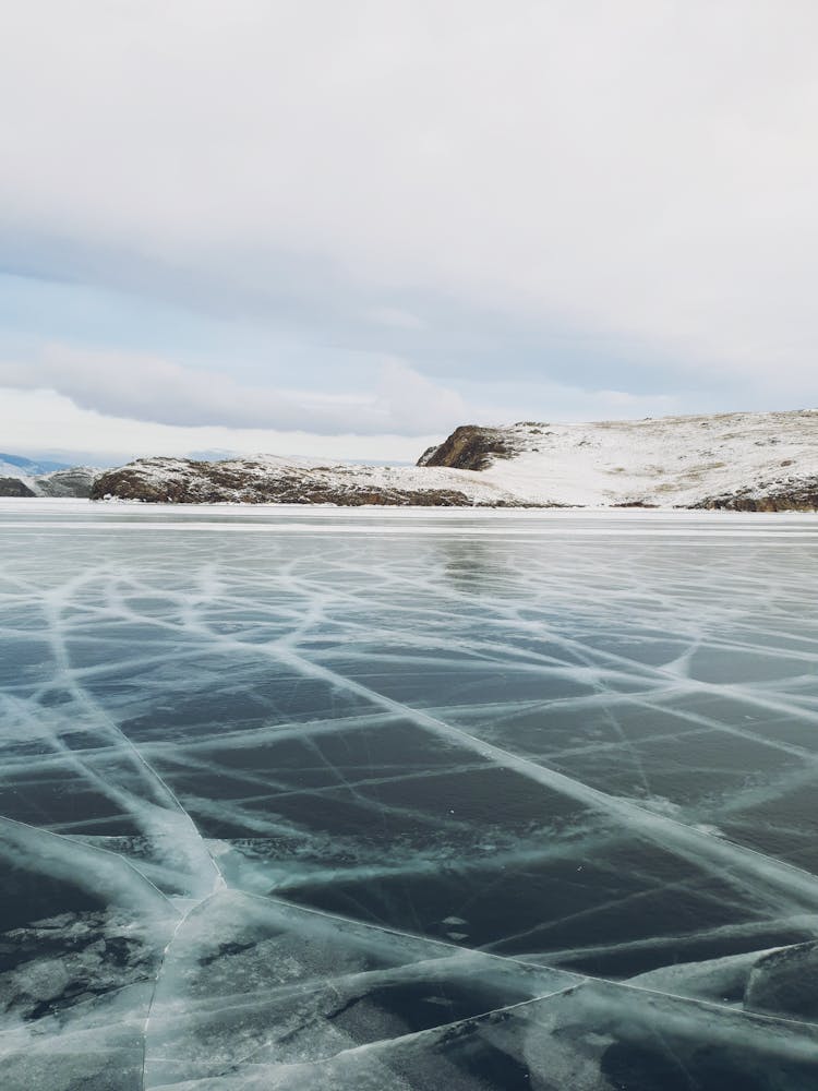 Cracks On Frozen Lake Baikal In Winter 