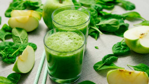 Free Green Liquid in Clear Drinking Glass Stock Photo