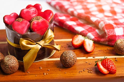 
A Close-Up Shot of a Chocolate Cake on a Wooden Surface