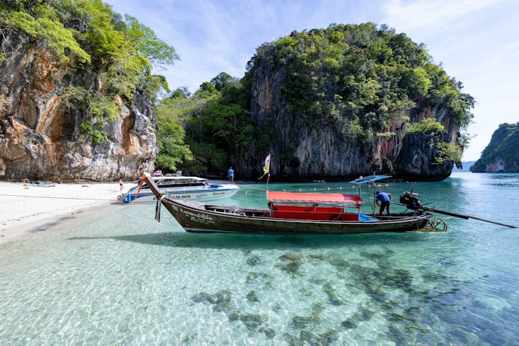 
A Boat Docked On A Shore