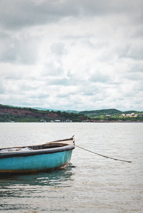 A Boat Floating on the Sea 