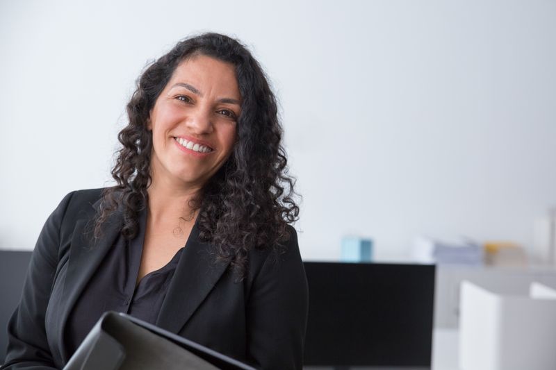 Cheerful woman in a corporate setting