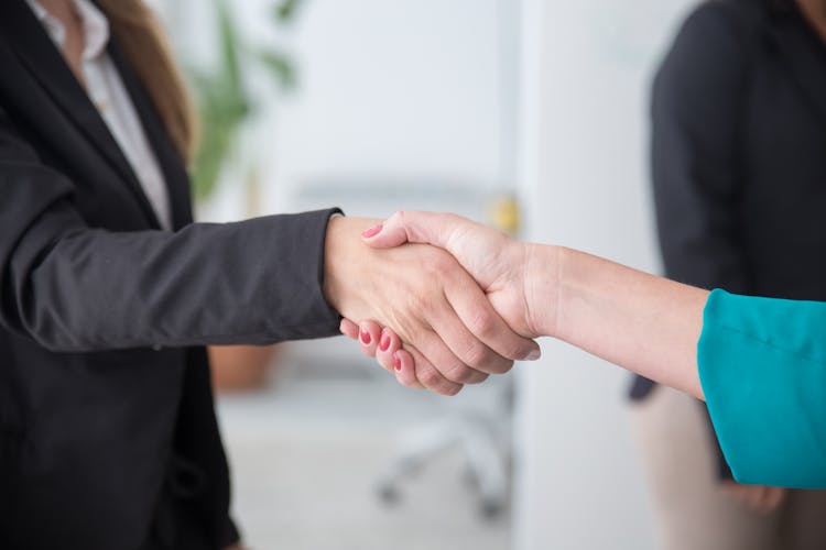 Close-Up Shot Of A Handshake