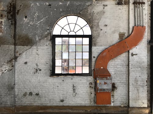 Free Old Industrial Interior with a Dirty Window  Stock Photo