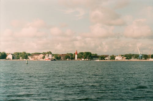 A Picturesque View of Buildings on the Shore